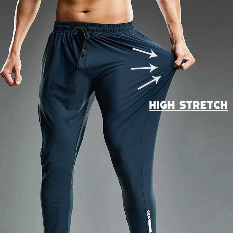 Hommes élastiques d'été fonctionnant pantalon sport jogging pantalon de survêtement décontracté de gymnase de gymnase de gym