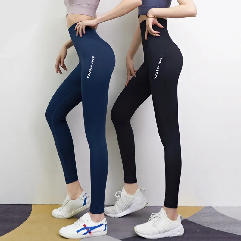 Pantaloni da donna dei leggings spingendo i collant da ginnastica sexy pantaloni sport yoga pantaloni in vita alta gambe fitness che gestisce pantaloni capri