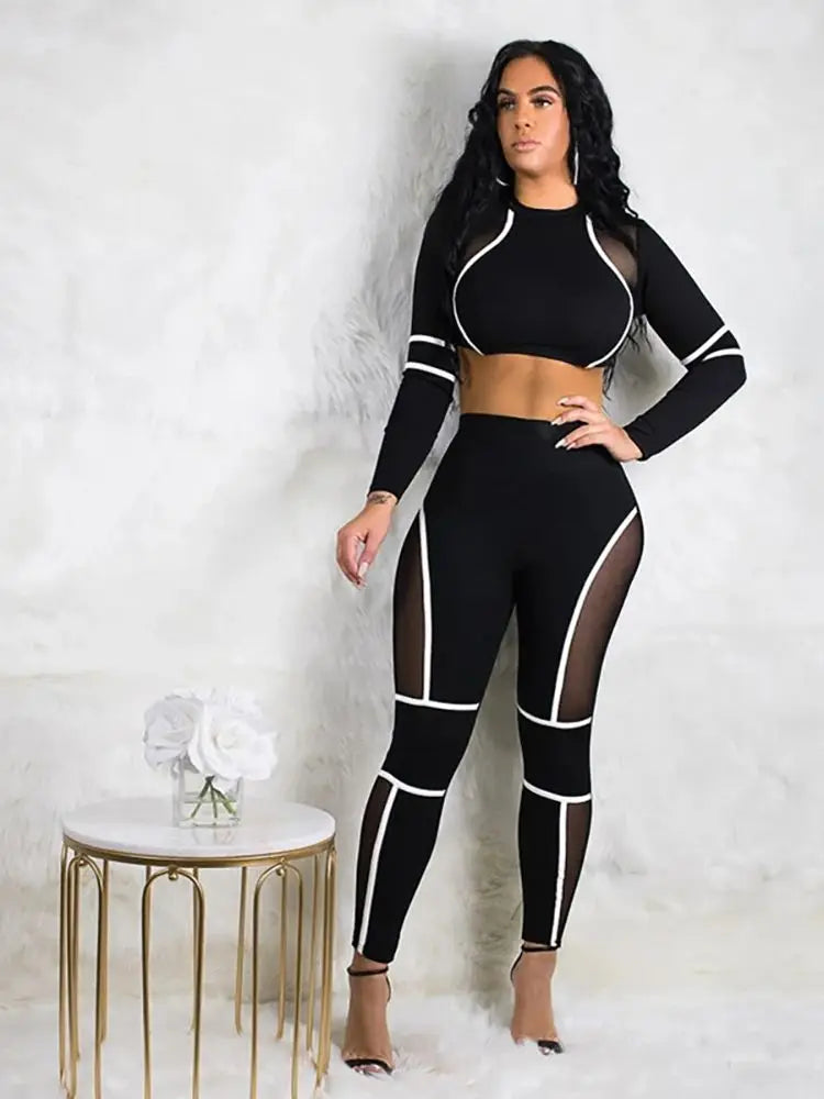 Fitness Set Sport Tracksuit Yoga Set One Piece Workout Soupchage à manches longues Sport Sportwear Gym Push Up Bodys pour femmes 2024