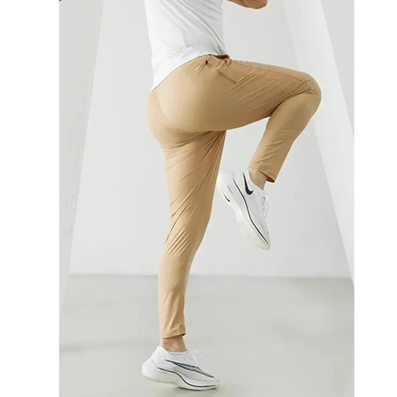 Pantaloni da corsa uomini abbigliamento sportivo jogging elastico pantaloni della tuta per palestra di fitness stretti rapido secco a secco per brani sottili da allenamento pantaloni sportivi