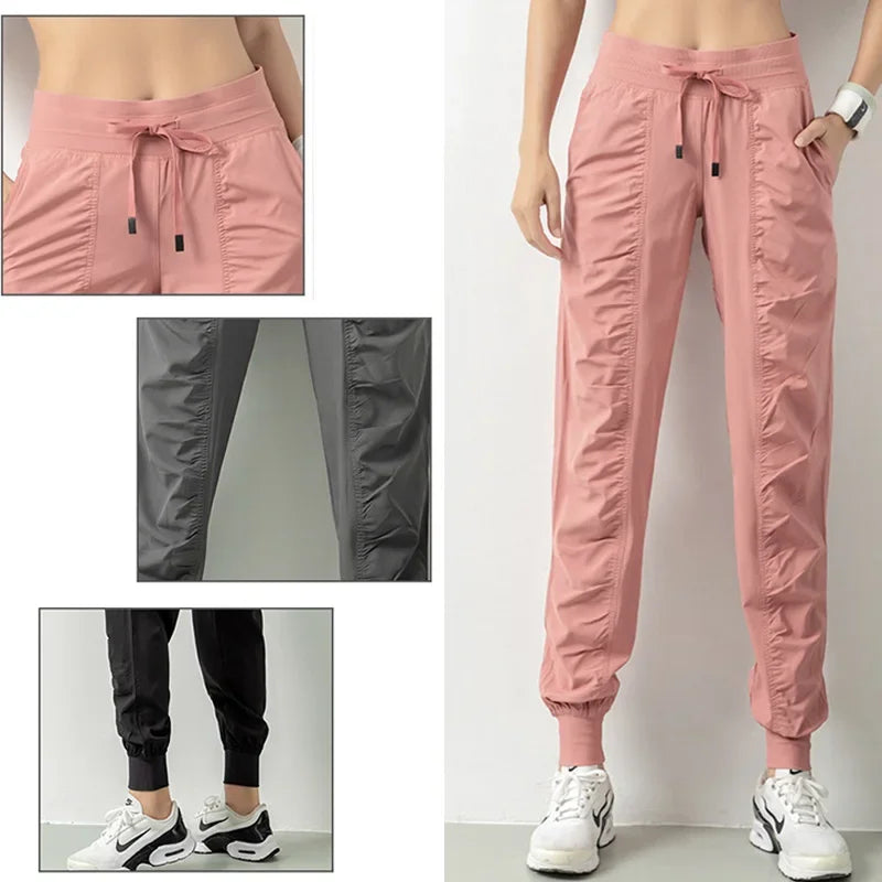 Tela de dibujo de tela Running Sport Joggers Mujeres Atletismo rápido de gimnasio Atletismo Fitness Pantalones con dos bolsillos laterales Pantalones de ejercicio