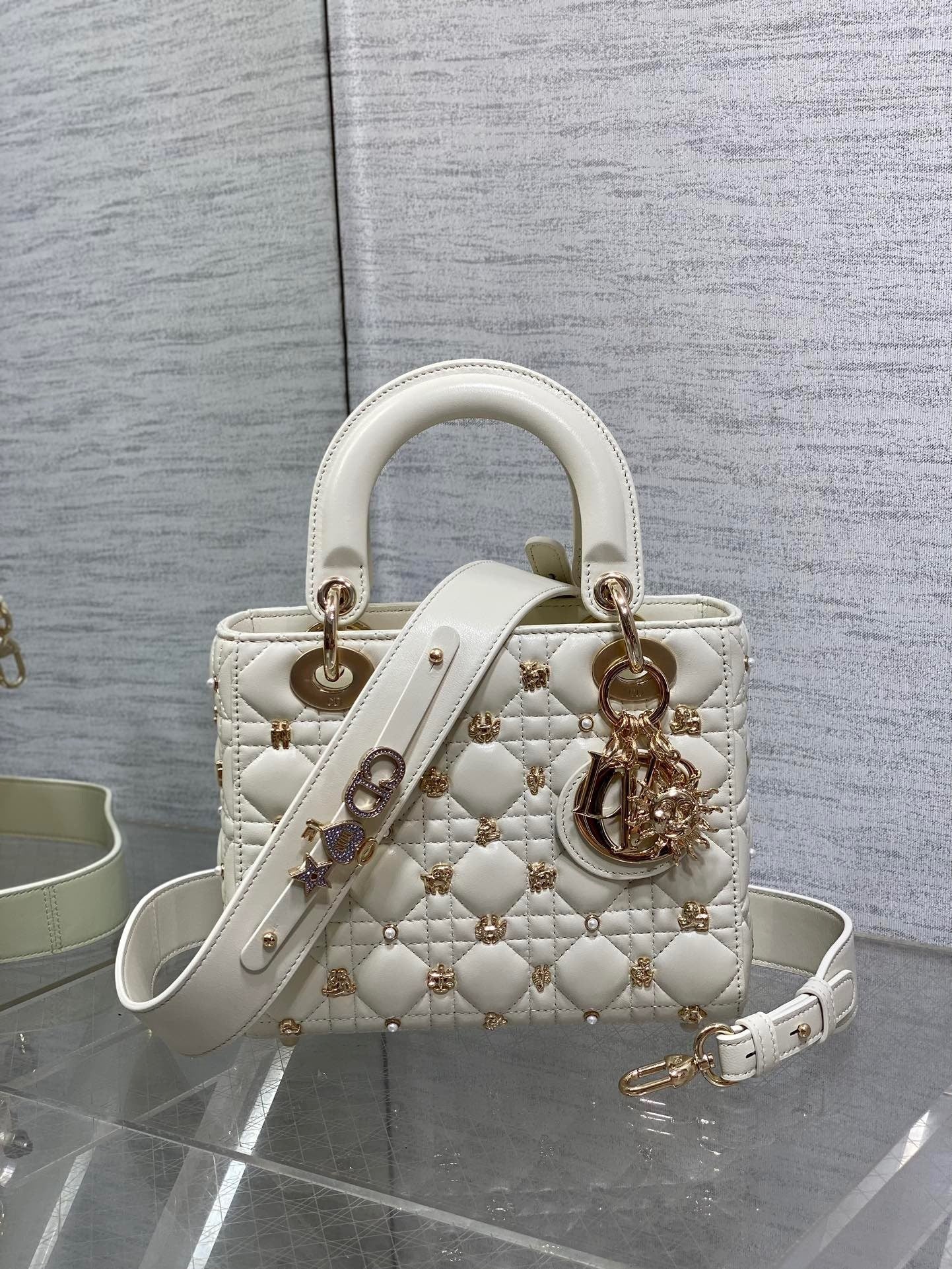  Luxury designer handbag with quilted leather, gold-tone hardware, and elegant structured silhouette—perfect for timeless sophistication.